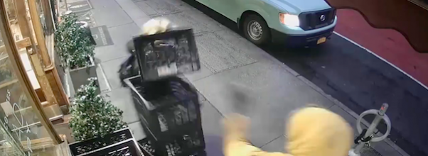 Man Assaults Woman with Stack of Milk Crates