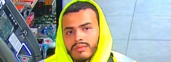 Smoke Shop Robber Stares Directly Into Surveillance Camera
