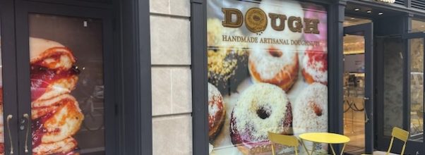 Signage up for the Popular Dough Doughnuts on Lexington Ave